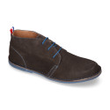 Suede leather ankle boots Oxford style with shoelaces and outsole in contrast.