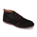 Suede leather ankle boots Oxford style with shoelaces and outsole in contrast.