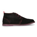 Suede leather ankle boots Oxford style with shoelaces and outsole in contrast.