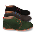 Suede leather ankle boots Oxford style with shoelaces and outsole in contrast.