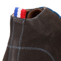 Suede leather ankle boots Oxford style with shoelaces and outsole in contrast.