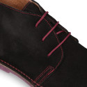 Suede leather ankle boots Oxford style with shoelaces and outsole in contrast.