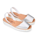 New metal finish leather Menorquina sandals with white soles.