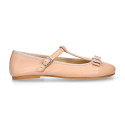 Soft leather T-strap little Mary Jane shoes with ribbon and buckle fastening.