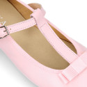 Soft leather T-strap little Mary Jane shoes with ribbon and buckle fastening.