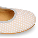 Classic suede leather ballet flat shoes with little dots printed.