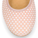 Classic suede leather ballet flat shoes with little dots printed.