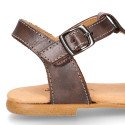 Cowhide Leather Sandal shoes with big flower and buckle fastening.