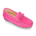 Suede leather Moccasin shoes with bows and driver type Outsole for large sizes.