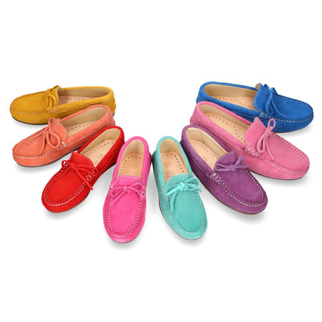 Suede leather Moccasin shoes with bows and driver type Outsole for large sizes.