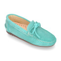 Suede leather Moccasin shoes with bows and driver type Outsole for large sizes.