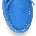 Suede leather Moccasin shoes with bows and driver type Outsole for large sizes.