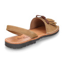 Nubuck leather menorquina sandals with rear strap and fringed tab.