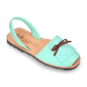 Nubuck leather menorquina sandals with rear strap and fringed tab.