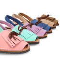 Nubuck leather menorquina sandals with rear strap and fringed tab.