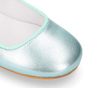 Aquamarine color soft leather girl halter Mary Jane shoes with buckle fastening.