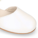 PRE-ORDER. Ceremony Mary Jane shoes in nappa leather in ivory color with flowers.