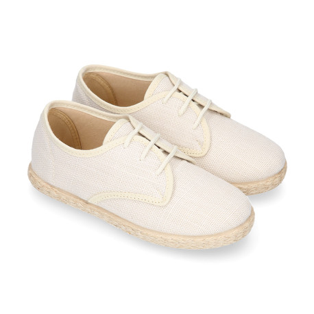 Zapato niño tipo Bamba en LINO BEIGE con cordones y suela alpargata.