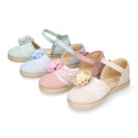 Linen canvas girl espadrille shoes for ceremony with lace and flower design.