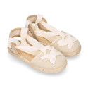 Cotton and linen canvas espadrille shoes Goyesca style with crossed ties in pastel colors.