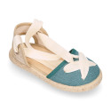 Cotton and linen canvas espadrille shoes Goyesca style with crossed ties in pastel colors.