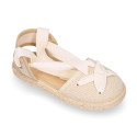 Cotton and linen canvas espadrille shoes Goyesca style with crossed ties in pastel colors.