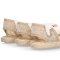 Cotton and linen canvas espadrille shoes Goyesca style with crossed ties in pastel colors.