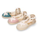 Cotton and linen canvas espadrille shoes Goyesca style with crossed ties in pastel colors.