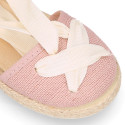 Cotton and linen canvas espadrille shoes Goyesca style with crossed ties in pastel colors.