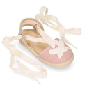 Cotton and linen canvas espadrille shoes Goyesca style with crossed ties in pastel colors.