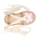 Cotton and linen canvas espadrille shoes Goyesca style with crossed ties in pastel colors.