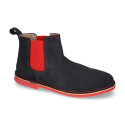 Ankle boot shoes with elastic band, stitching and outsole in contrast in suede leather.