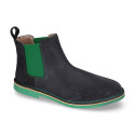 Ankle boot shoes with elastic band, stitching and outsole in contrast in suede leather.