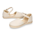 Structured linen canvas girl espadrille shoes with buckle fastening in beige color.