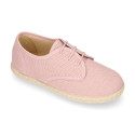 Linen kids laces up shoes espadrille style in pastel colors.