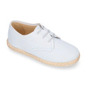 Linen kids laces up shoes espadrille style in pastel colors.