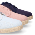 Linen kids laces up shoes espadrille style in pastel colors.