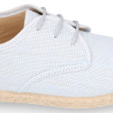 Linen kids laces up shoes espadrille style in pastel colors.