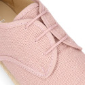 Linen kids laces up shoes espadrille style in pastel colors.