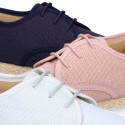 Linen kids laces up shoes espadrille style in pastel colors.