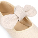 Stylized little Girl Mary Jane shoes with hook and loop strap with bow in ivory linen.