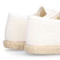 Linen kids laces up shoes espadrille style in white color.