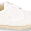 Linen kids laces up shoes espadrille style in white color.