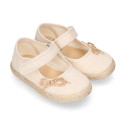 Cotton canvas little girl Mary Jane shoes with hook and loop strap and bow design.