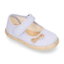 Cotton canvas little girl Mary Jane shoes with hook and loop strap and bow design.