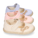 Cotton canvas little girl Mary Jane shoes with hook and loop strap and bow design.