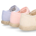 Cotton canvas little girl Mary Jane shoes with hook and loop strap and bow design.