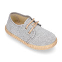 Kids laces up shoes espadrille style in cotton canvas to dress.