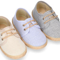 Kids laces up shoes espadrille style in cotton canvas to dress.