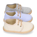 Kids laces up shoes espadrille style in cotton canvas to dress.